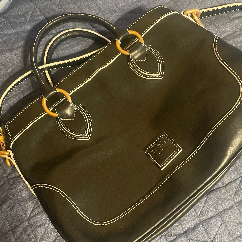 Dooney and Bourke florentine, brand new, worn once didn’t like the way it fit